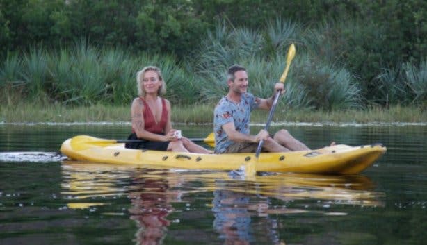 Tribe in iii kayak