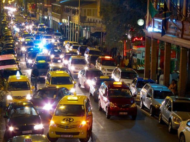 taxi cars long street at night