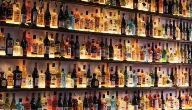 Illuminated-wall-of-bottles-new-place