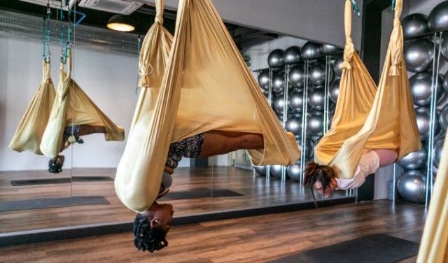 Suspended pilates, intense dance classes, hot yoga + more at this boutique  gym